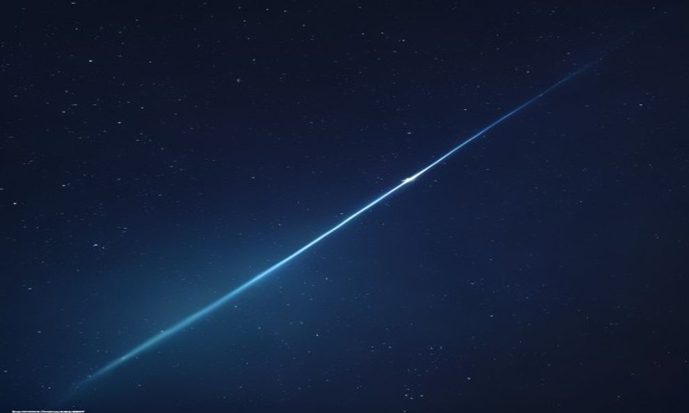 深い藍色の夜空に流れ星が一筋走るシネマティックなイメージ